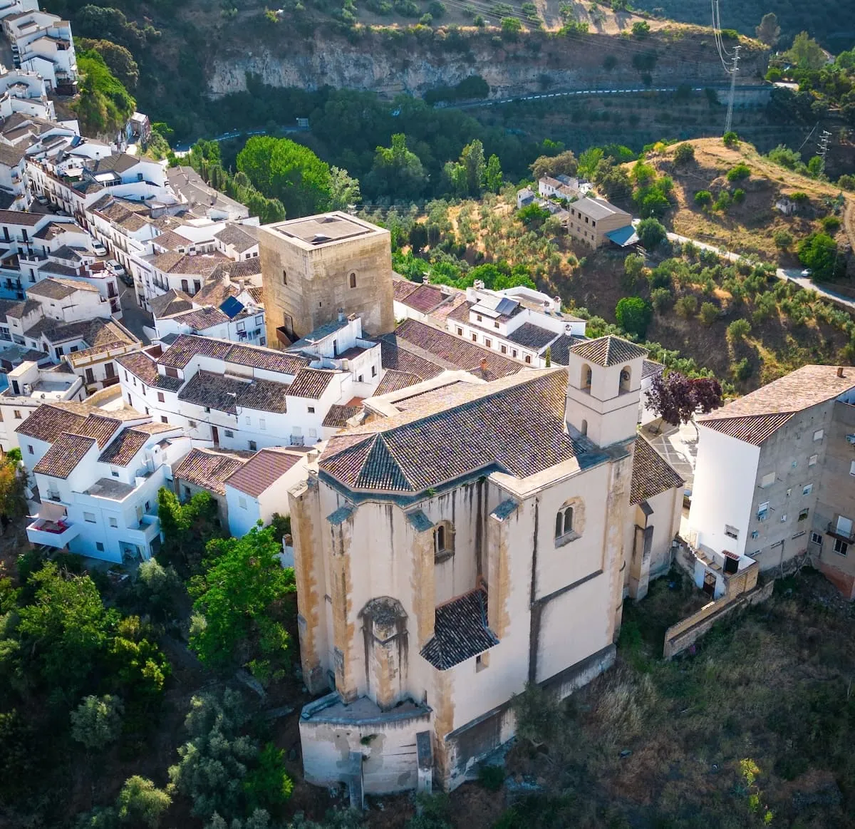 Aerial view of Setenil de las Bodegas with the Iglesia de la Encarnación, the Torre del Homenaje and the white houses of the village